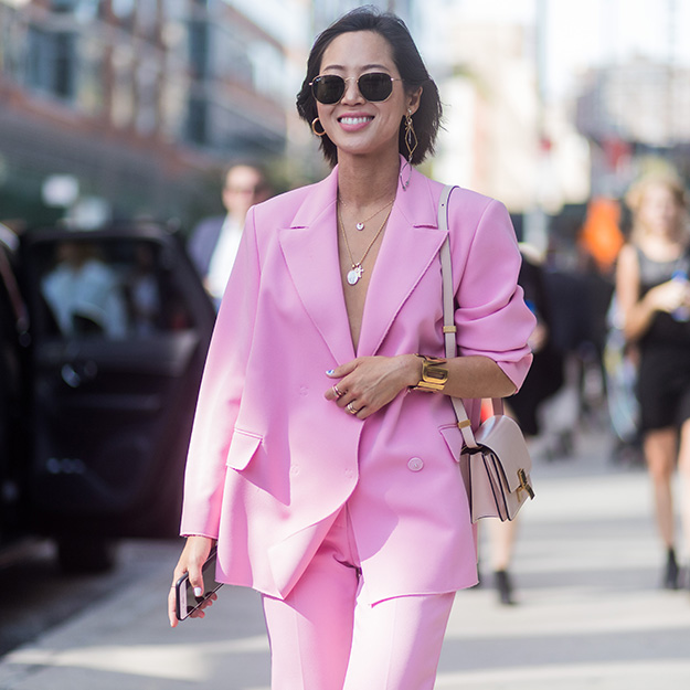 Aimee Song in a millennial pink pantsuit