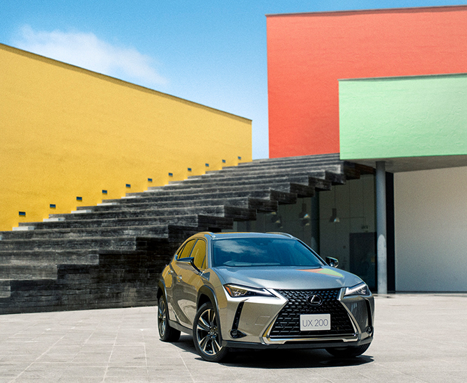 Lexus UX front view with colorful background