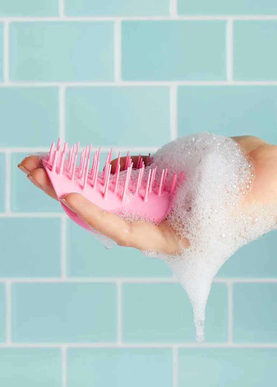Why you need a scalp brush now (and where to shop them)