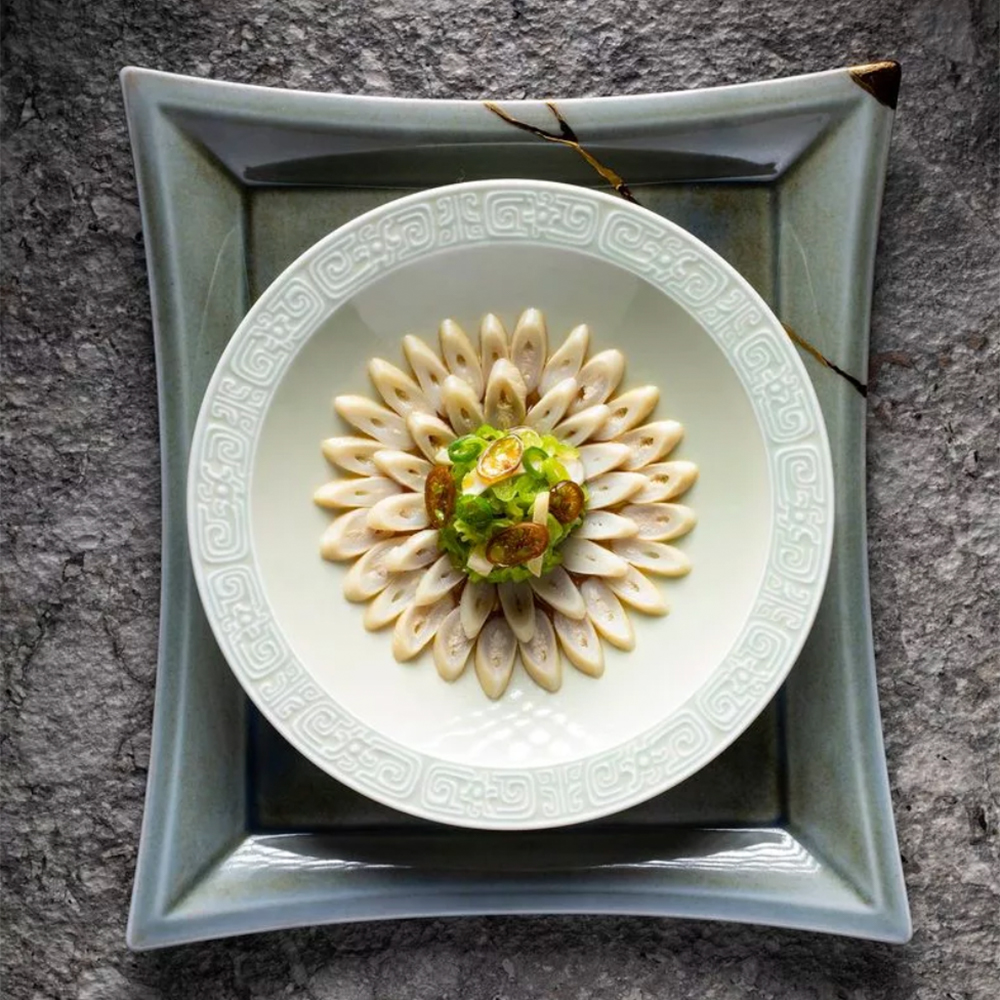 The ChairmanWho says a no-MSG restaurant can’t be delicious? Just look at The Chairman, which is the first Hong Kong restaurant to top Asia’s 50 Best Restaurants list and holds one Michelin star. The establishment stays true to the team’s creativity, presenting new dishes on rotation throughout the year based on ingredient seasonality, while referencing classic recipes to preserve and invent new ways to celebrate Chinese cuisine. Must-tries include steamed flower crab with aged Shaoxing wine and fragrant chicken oil with flat rice noodles, thick-cut Chairman-style char siu, and slipper lobsters poached in rice broth. Address: 3/F, The Wellington, 198 Wellington Street, Central, Hong Kong Island